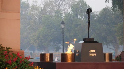 Extreme close up of the flame at india gate in new delhi- 4K 60p Stock Footage 107313447