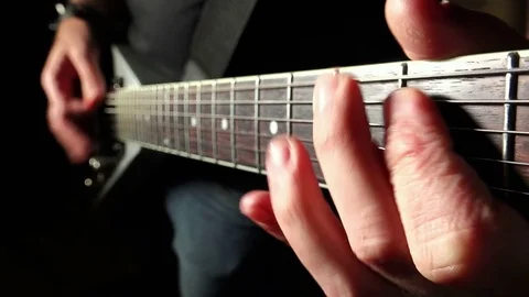 Extreme close up footage on hands playing electric guitar Stock Footage 72637892