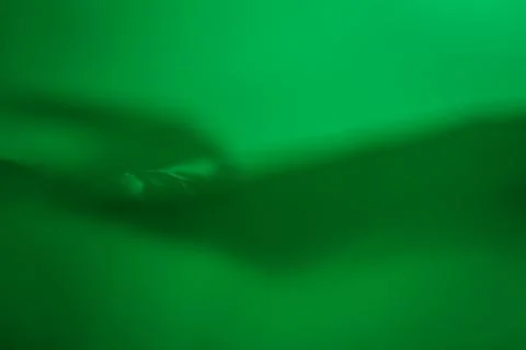 Extreme close up of green plastic texture background. Fotos Stock