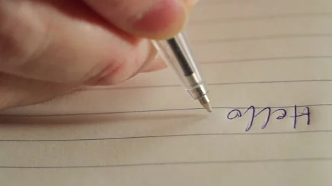 Extreme close-up of a hand with a pen Stock Footage 162560423