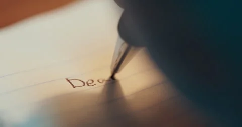 Extreme Close Up Of Hand Writing Dear Mom Letter On Lined Paper Stock Footage 336437013