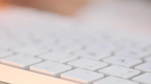 Extreme close of hands typing, preparing reports and documentation. Stock Footage 296212500