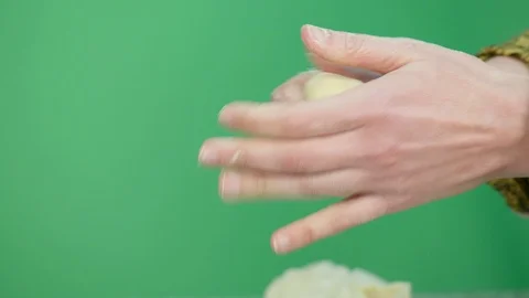 Extreme close up hands of woman while shaping baked goods with cereals - gree Stock Footage 126607487