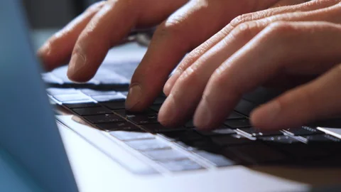 Extreme close-up human hands on keyboard 4K. Businessman hands type Stock Footage 128592389