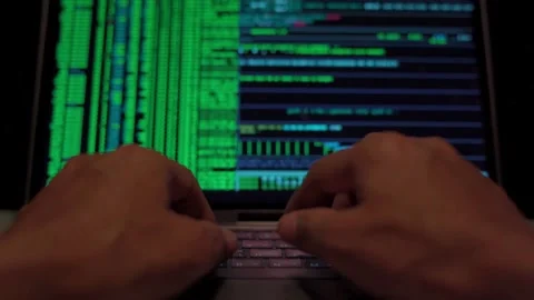 Extreme close-up human hands on keyboard 4K Programmer analyzing compiling code 스톡 동영상 334585921