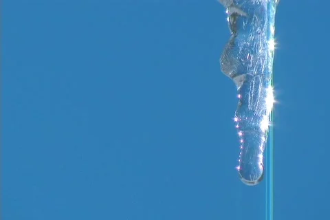 EXTREME CLOSE-UP ICICLE DRIPPING Stock-Footage 109760