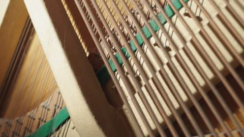 Extreme Close-Up: Inside Upright Piano Strings and Soundboard Detail Video stock 329891720