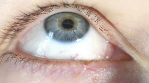 Extreme close-up macro eye freckled face of red haired woman with blue eyes Stock Footage 127697482