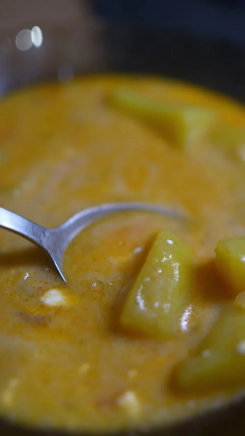 Extreme close-up macro shot of a silver spoon Stock Footage 329116940