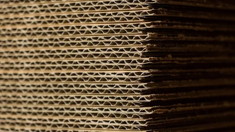 Extreme close up / macro slide of stacked cardboard boxes. Stock Footage 72770398