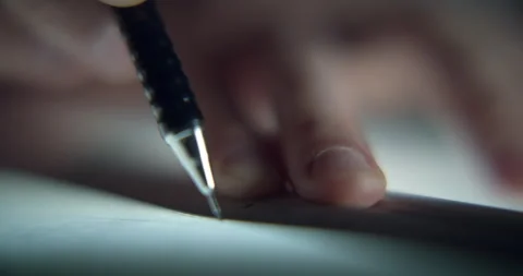 Extreme Close-Up of Man Drawing Blueprint with Pencil and Ruler 库存影片 343693297