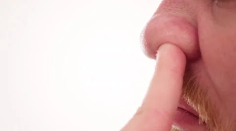 Extreme close up of a man picking nose Stock Footage 63083497