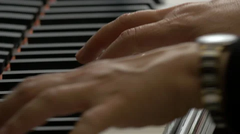 Extreme close up of a man playing the piano in Venice Stock Footage 59883785