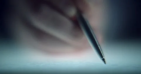 Extreme Close-Up of Man Signing Document with Shallow Depth of Field Stock Footage 343694397