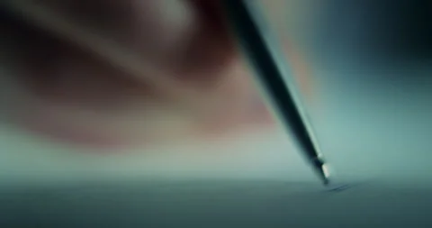 Extreme Close-Up of Man Signing Document with Shallow Depth of Field Stock Footage 343694470