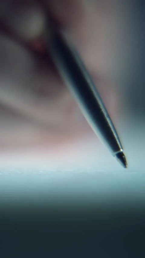 Extreme Close-Up of Man Signing Document with Shallow Depth of Field Stock Footage 343757360