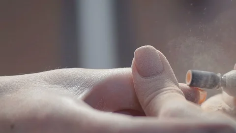 Extreme Close-up, Manicure Master Cleans Old Luck Nails on Woman's Hand Stock Footage 92177684