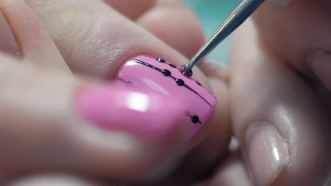 Extreme Close-up, Manicure Master Decorates Woman's Nail in Beauty Salon Stock Footage 92205723