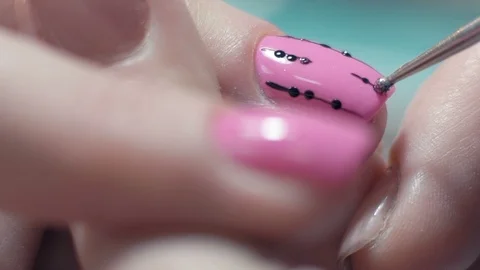 Extreme Close-up, Manicure Master Draws Pattern on Nail Woman in Beauty Salon Stock Footage 92205865