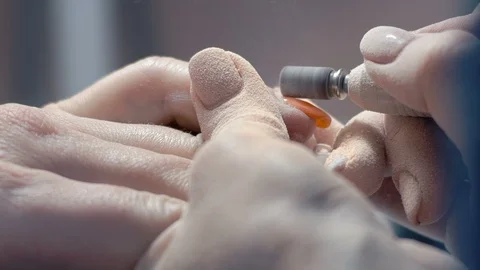 Extreme Close-up, Manicure Master Slices Old Luck Layer with Nail on Woman's Stock Footage 92178227