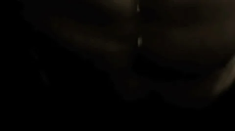 Extreme close up of mans face while he's doing push ups Stock Footage 33830877