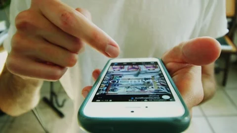 Extreme Close Up Of Mindlessly Fast Swiping And Liking On Social Media Stock Footage 265071717