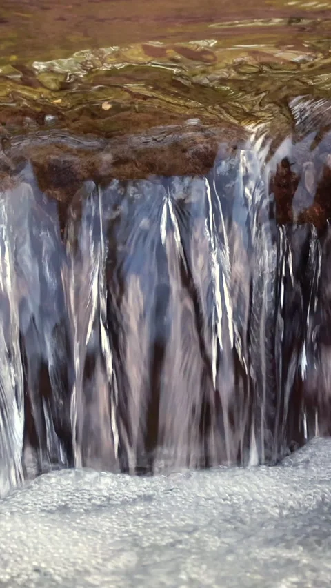 Extreme Close Up Of A Miniature Waterfall In A Forest Brook. Clear Water Cascade Stock Footage 314673293