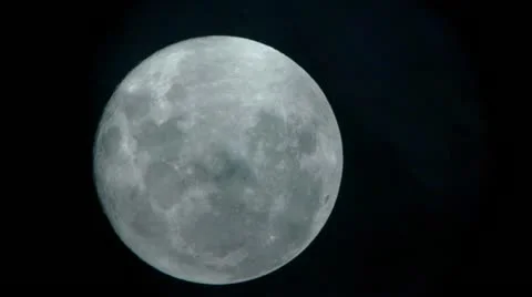 Extreme Close Up of Moon with Passing Clouds - HD Stock Footage 11145745
