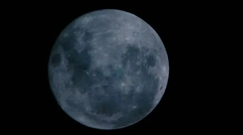 Extreme Close Up of Moon with Passing Clouds - HD Stock Footage 11145774