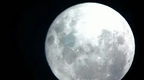 Extreme Close Up of Moon with Passing Clouds - HD Stock Footage 11145819