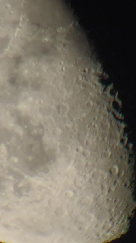 Extreme Close-Up of the Moons Cratered Surface and Terminator Line Stock Footage 317113142