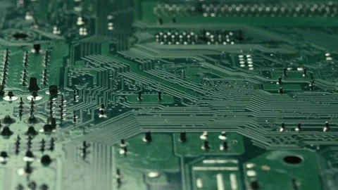 Extreme Close up motion view Green circuit board, semiconductor pins, rack Stock Footage 170458575