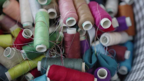 Extreme Close Up of Multi Colored Sewing Threads Stock Footage 263539558