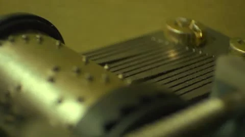 Extreme close up of a music box movement, seamless loop Stock Footage