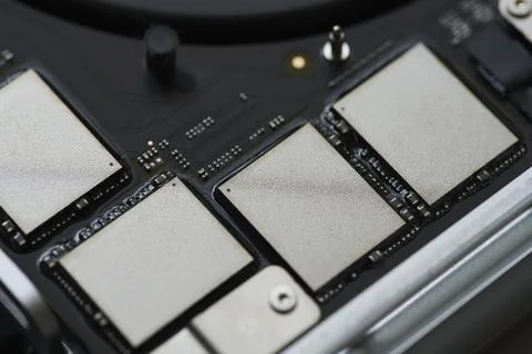 Extreme close up of NAND memory chips inside device Stock Photos