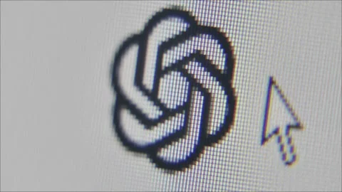 Extreme Close up OpenAI logo on screen, user pointing cursor and ChatGPT Popup Stock Footage 243349958