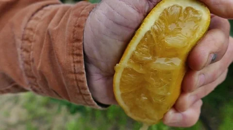 Extreme Close Up of Orange Squeeze Video stock 47375429