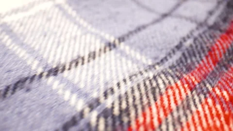 Extreme close up over a plaid patterned flannel shirt. Stock Footage 134981990
