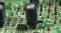 Extreme Close Up Pan Computer Electric Board Circuitry Manufacturing Process HD Footage