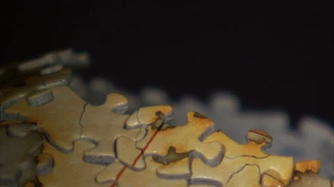 Extreme close up of piece added to 3D globe puzzle. Stock Footage 52326232