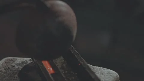 Extreme Close-up of Pouring Molten Liquid Silver into a Metal Mold Video stock 333734342