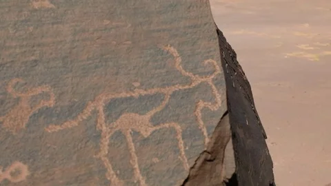 Extreme Close Up Prehistoric Petroglyph Human Figure Animal Rock Morocco Stock Footage 334788949