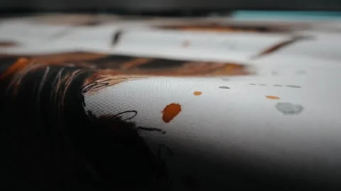 Extreme close up of printed material being rollered Stock Footage 135160551