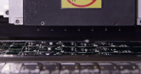 Extreme close up printing circuit board in factory Stock Footage 89512702