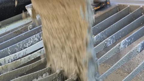 Extreme Close Up of Ready Mix Concrete Pouring into Pump Hopper Stock-Footage 335709911