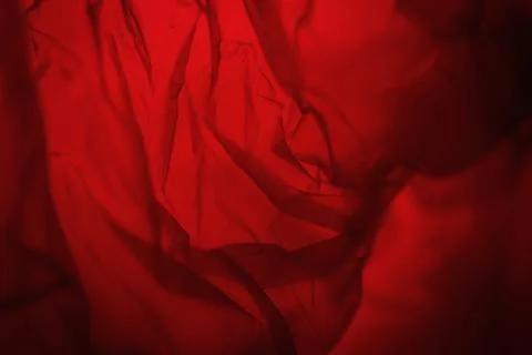 Extreme close up of red plastic texture background. Stock Photos