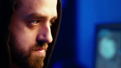 Extreme close up of rogue programmer running code in graffiti painted basement Video stock 319517457