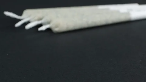 Extreme close up of rolled Cannabis cigarettes. Stock Footage 108282961