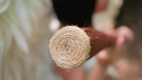 Extreme Close Up of Rope Wrapped Staff Rotating Gently in Soft Focus Stock Footage 321594787