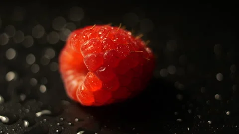 Extreme Close Up of Rotating Raspberry in 50p Stock Footage 336700194